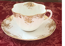 Dainty Gold cup and saucer